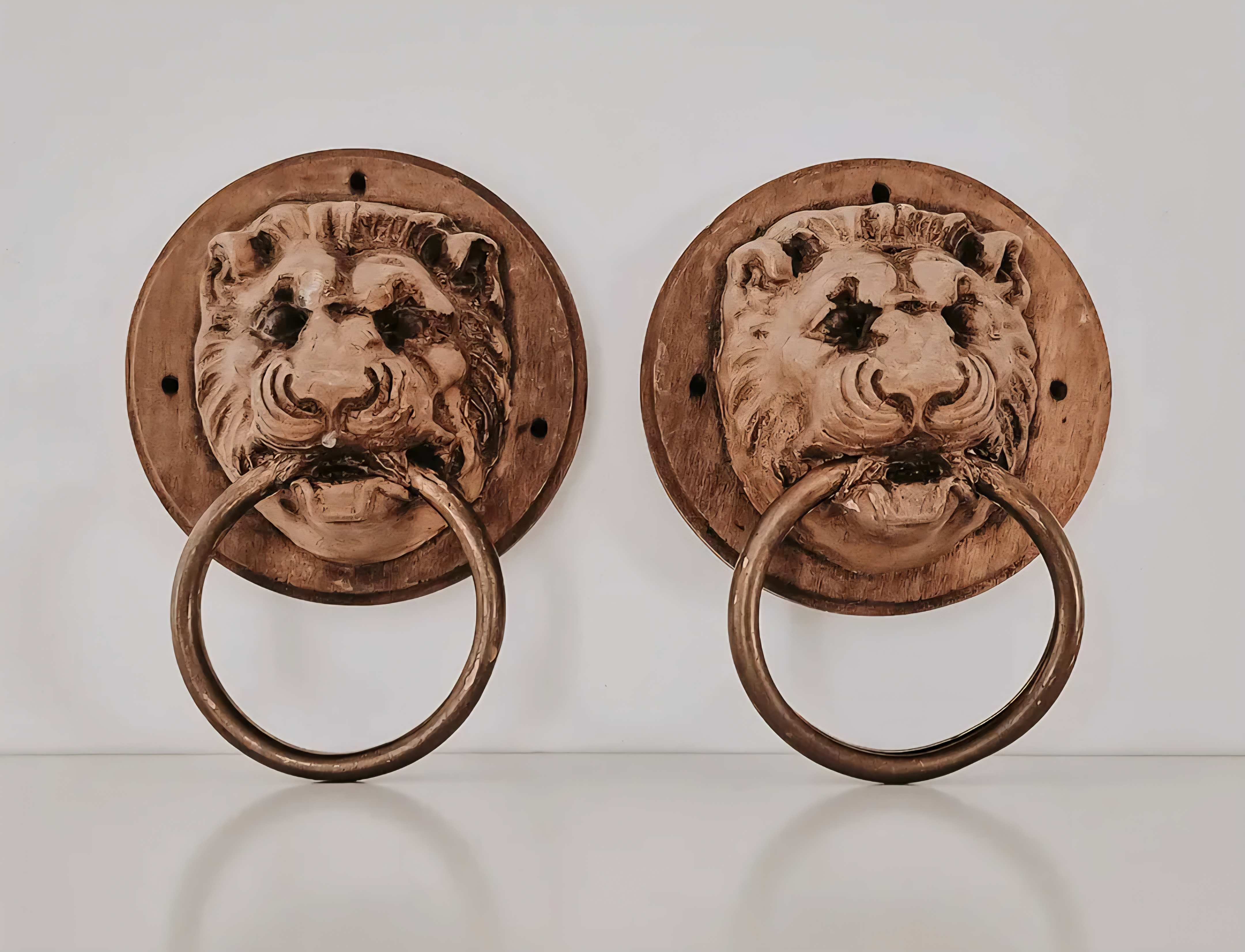 Pair of Wooden Lion Head Rings